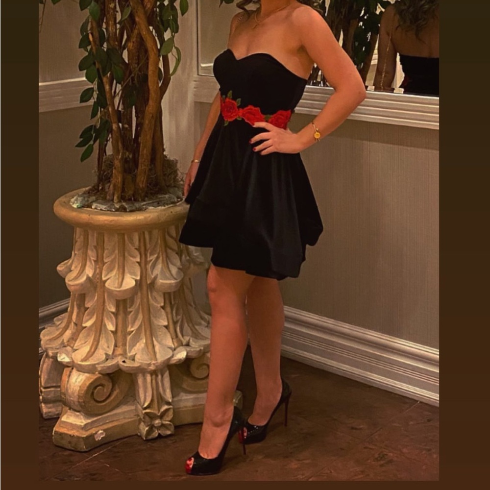 Black Strapless Dress with Red Floral Detail